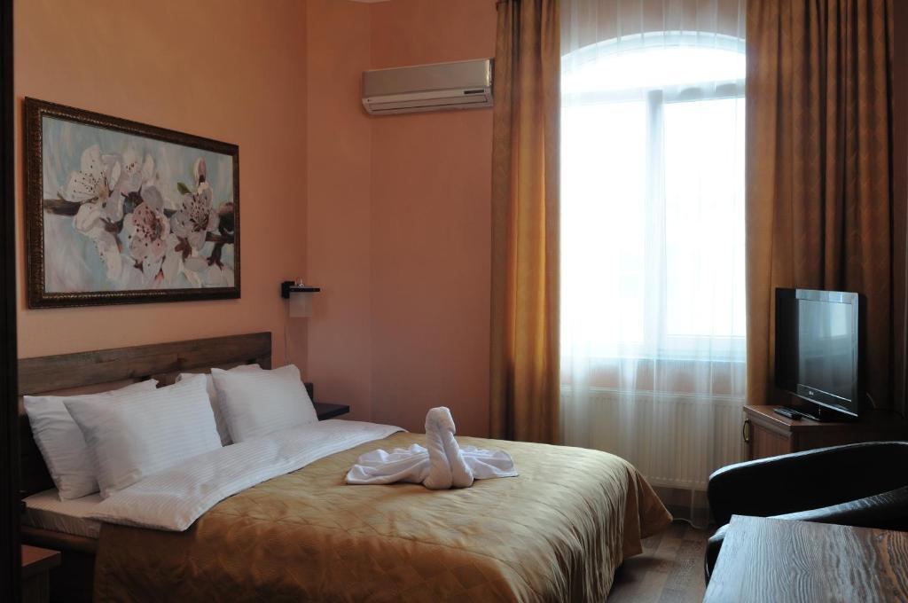 Melrose Hotel Rivne Szoba fotó